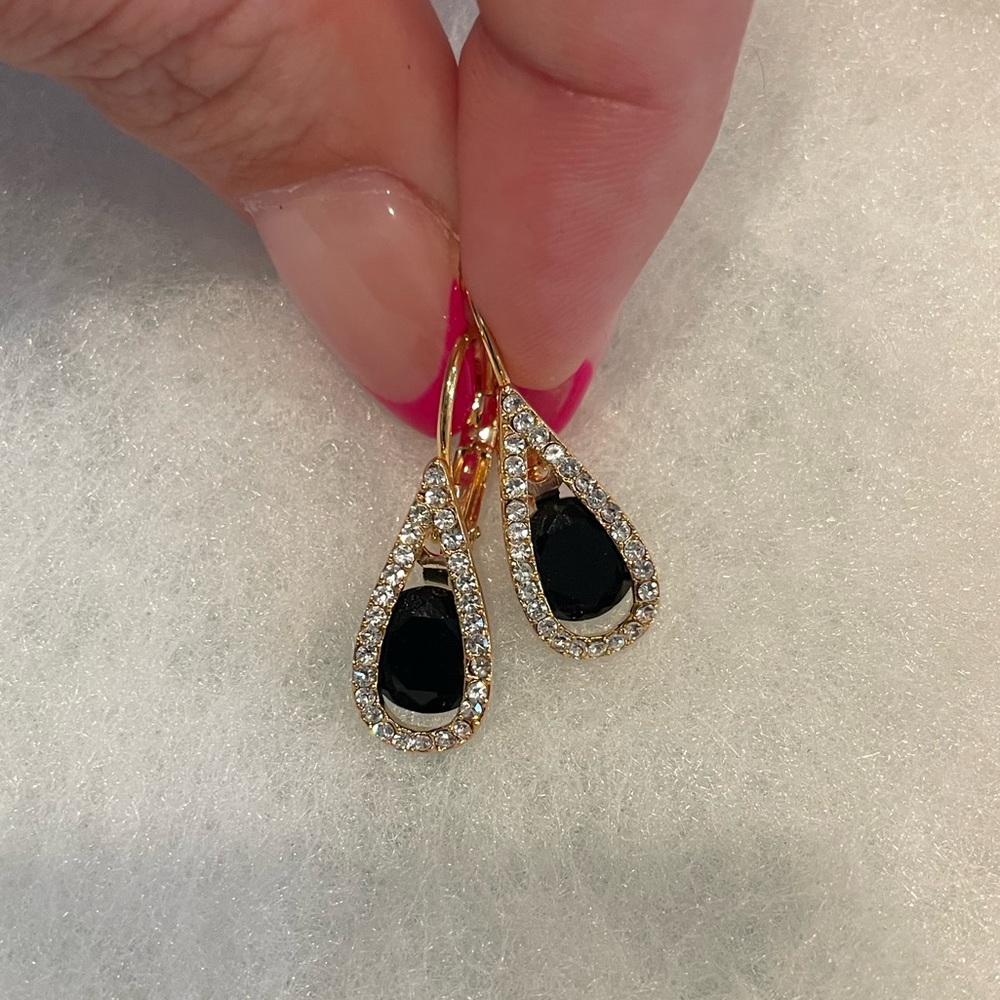 Dangling gold earrings